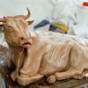 Mucca seduta - terracotta